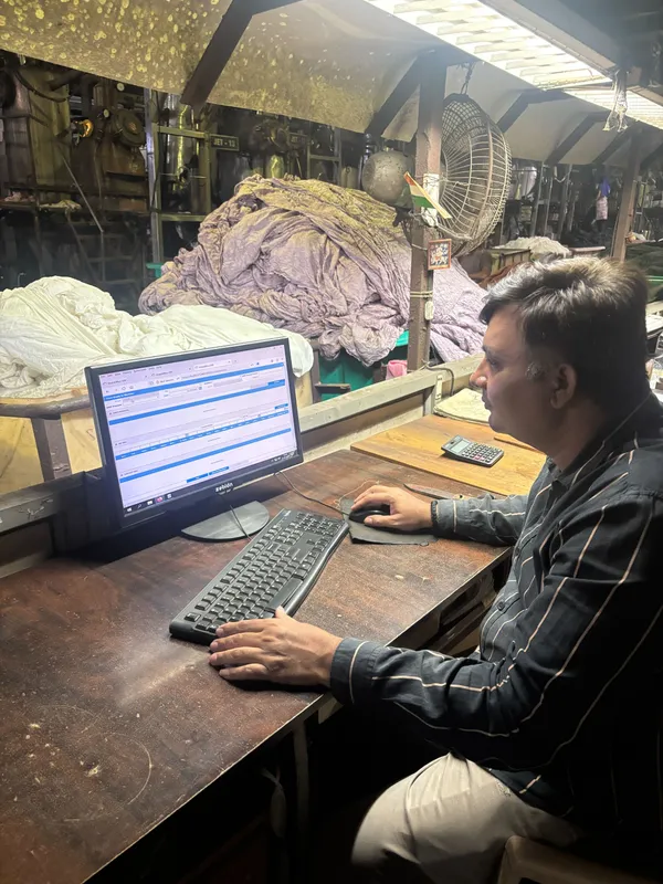 Floor supervisor accessing MobiOffice at Bindal Silk Mills dyeing floor